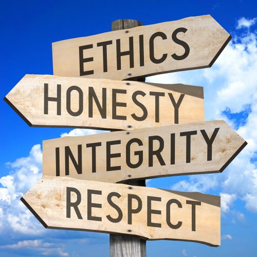 Business ethics - wooden signpost